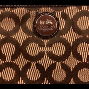 Brown CCs Coach patent wristlet